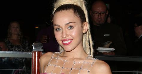 The racy picture shows the 26-year-old pop star going mostly nude in the desert with a large black and. . All miley cyrus nude pictures